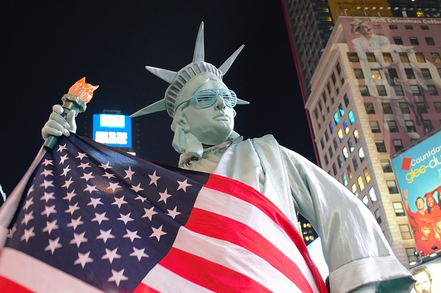 A woman dressed as the Statue of Liberty