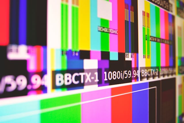 Flat screen TV showing colour bars