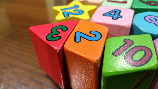 Coloured wooden blocks with numbers on them