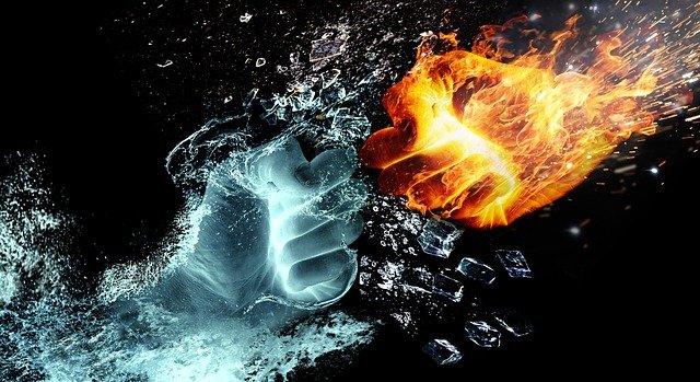 A flaming hand strikes an icy hand
