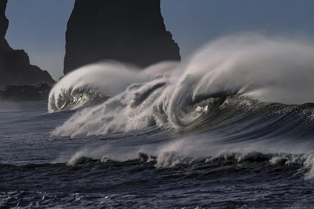 Wind swept waves on a battered coastline