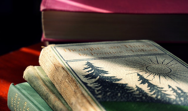 A stack of hardback books