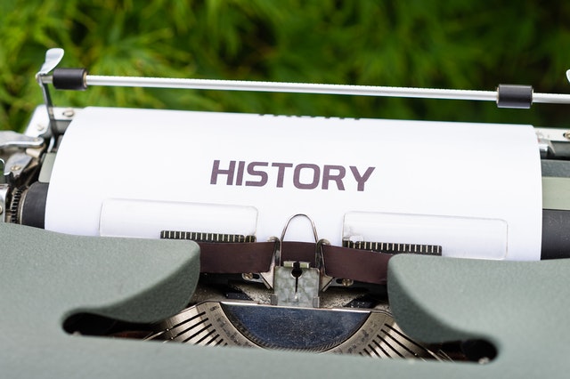 Type writer displaying the word 'history' in capital letters
