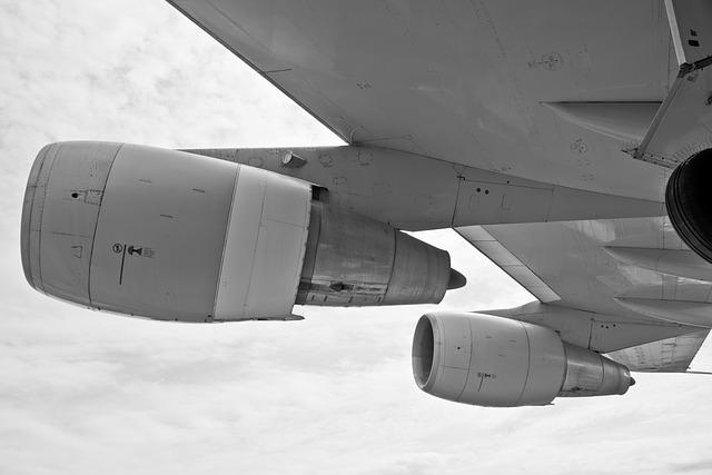 Two aircraft engines in flight